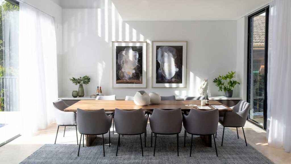 a room with a table and chairs to give you an example of Chain of Title for a home
