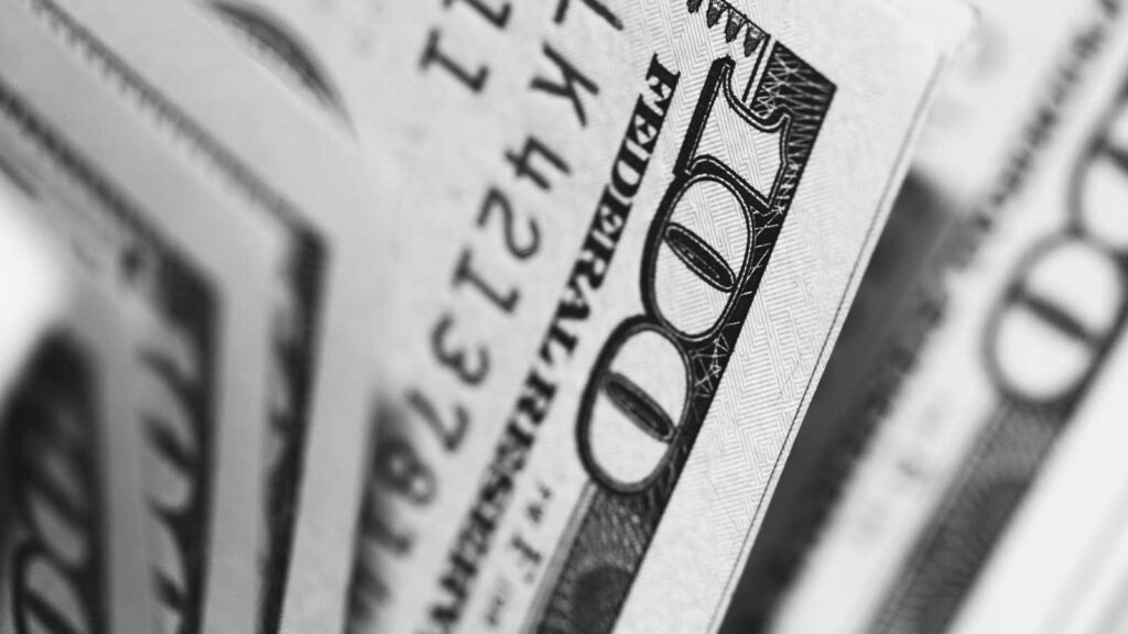 a close up of a stack of money showing an example of Bankruptcy Records Online for Free