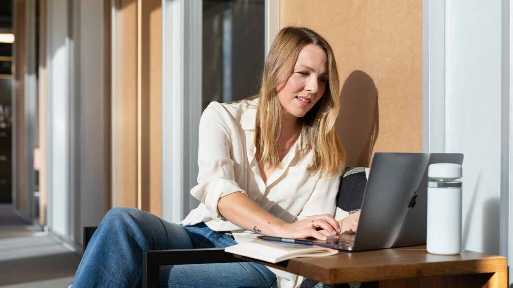 Top Title Search Companies in the U.S. 2025 Guide image of a person on the computer